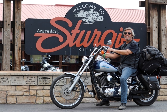 with the Sturgis sign_4733