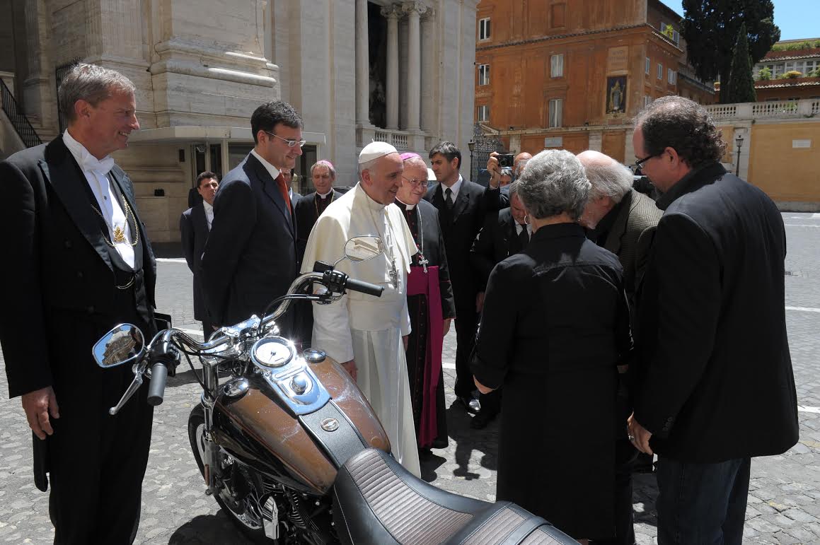 The Davidson family presents Pope Francis with his 2013 Harley-Davidson Dyna Super Glide
