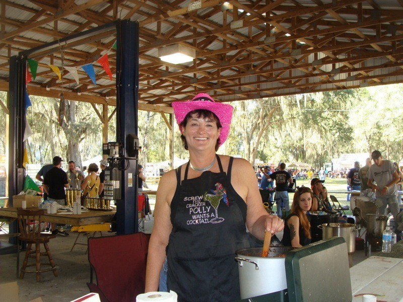 Polly from Fred's Cluster Fux team out of Plant City stirs her team's "Chili to dies for"
