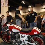 Matt from Mitchell Tech discusses the custom CB750 with interested attendees