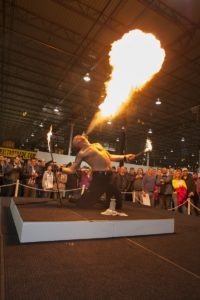 The fire breather wows awed onlookers at the Gibraltar Trade Center