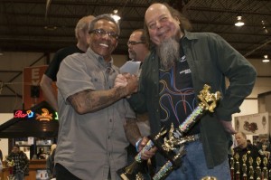 Bobby James, a.k.a. the “King of Shine,” accepts a Special Recognition Award from Ron Finch for Best Chrome (imagine that!)