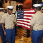 University of Memphis ROTC members present the flag
