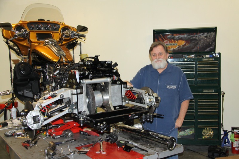Certifi ed trike conversion specialist Randall Johnston and the 2015 CVO Ultra undergoing a facelift