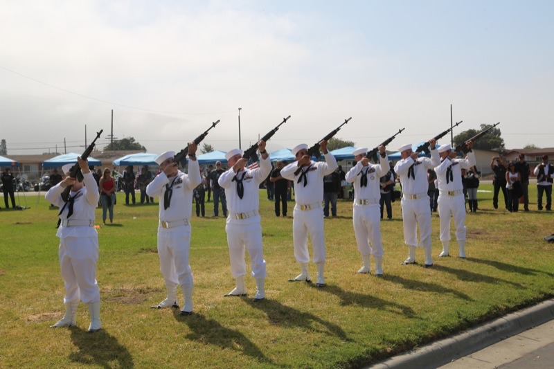 Sailors performed a 21-gun salute in honor of the victims of 9/11